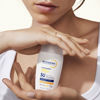 Photoderm XDEFENSE ultra fluidna zaščita pred soncem SPF 50+, odtenek 02